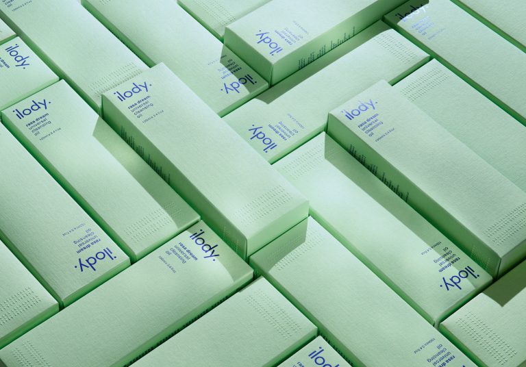 Ilody green skincare packaging boxes arranged in structured pattern