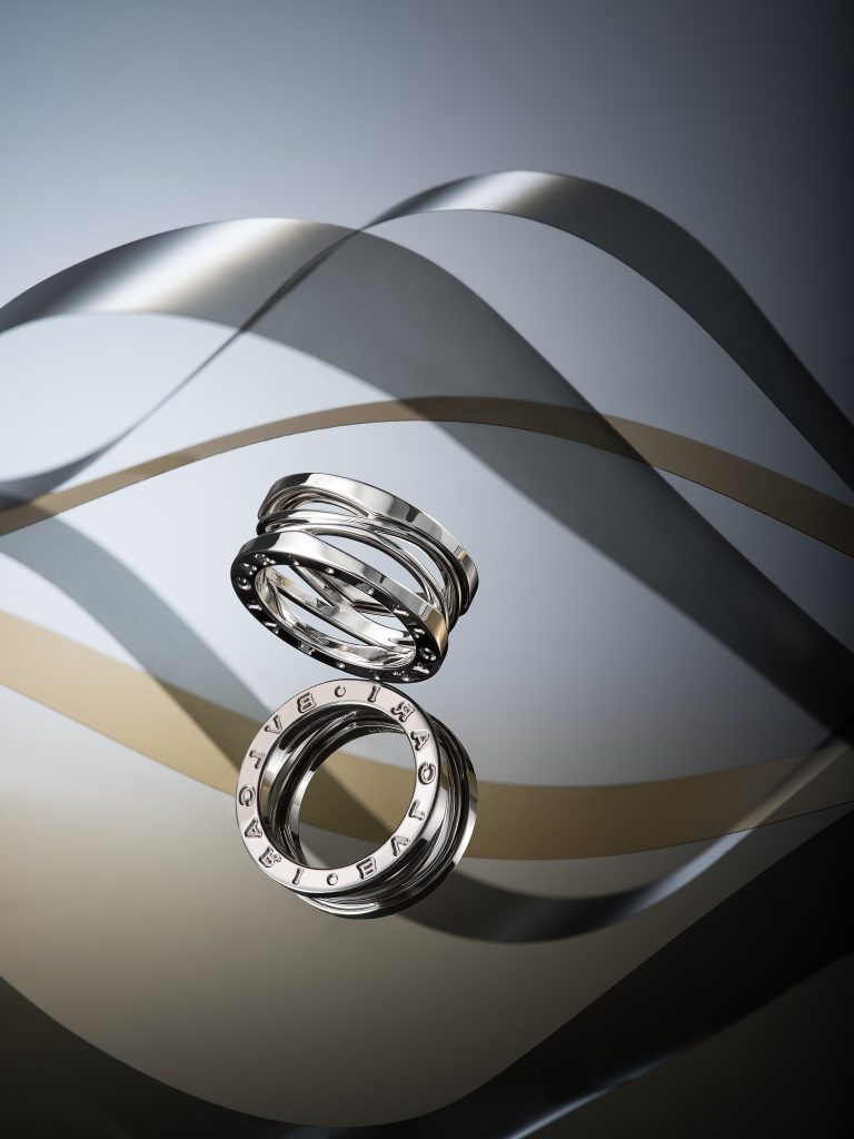 Bulgari rings with silver and gold sculptural backdrop in studio still life