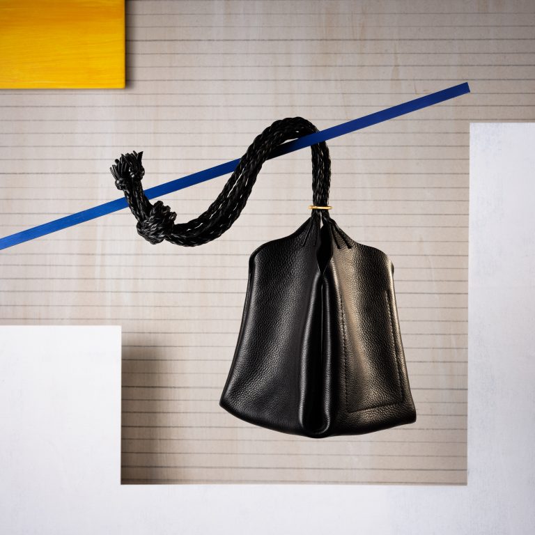 Mark Tallowin Baluchon leather bag suspended within modernist-inspired geometric set