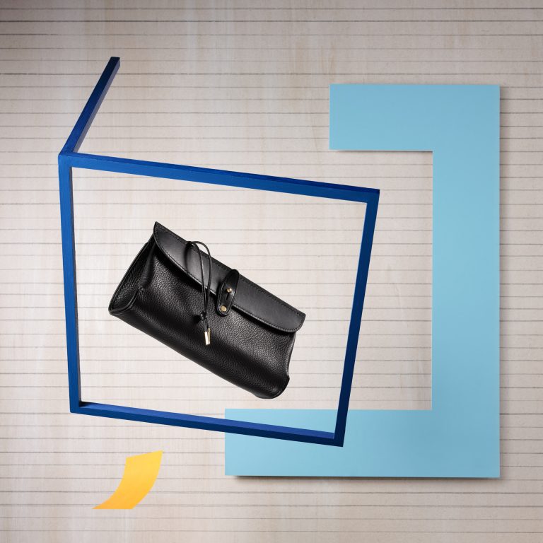 Mark Tallowin Inkwell leather bag against abstract geometric backdrop