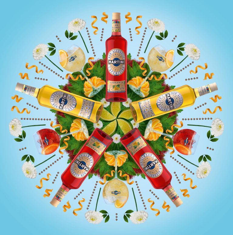Martini bottles arranged in colourful radial still life with citrus and botanicals