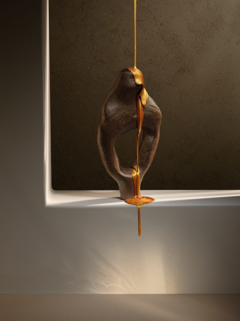 Sculptural vessel with liquid pouring over edge on minimal set, conceptual still life